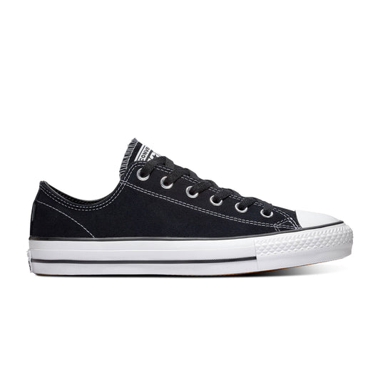side view of black suede lowtop chuck taylor skateboard shoe, with white sole