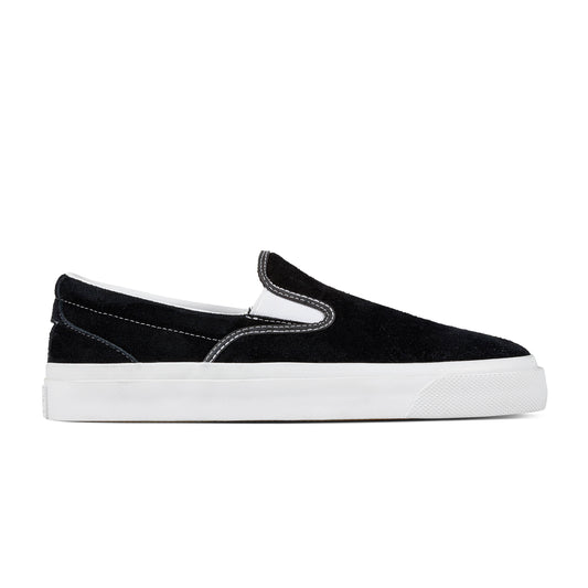 Side view of black suede upper slip on skateboard shoe