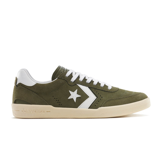 side view of green suede lowtop skateboard shoe with off white rubber sole