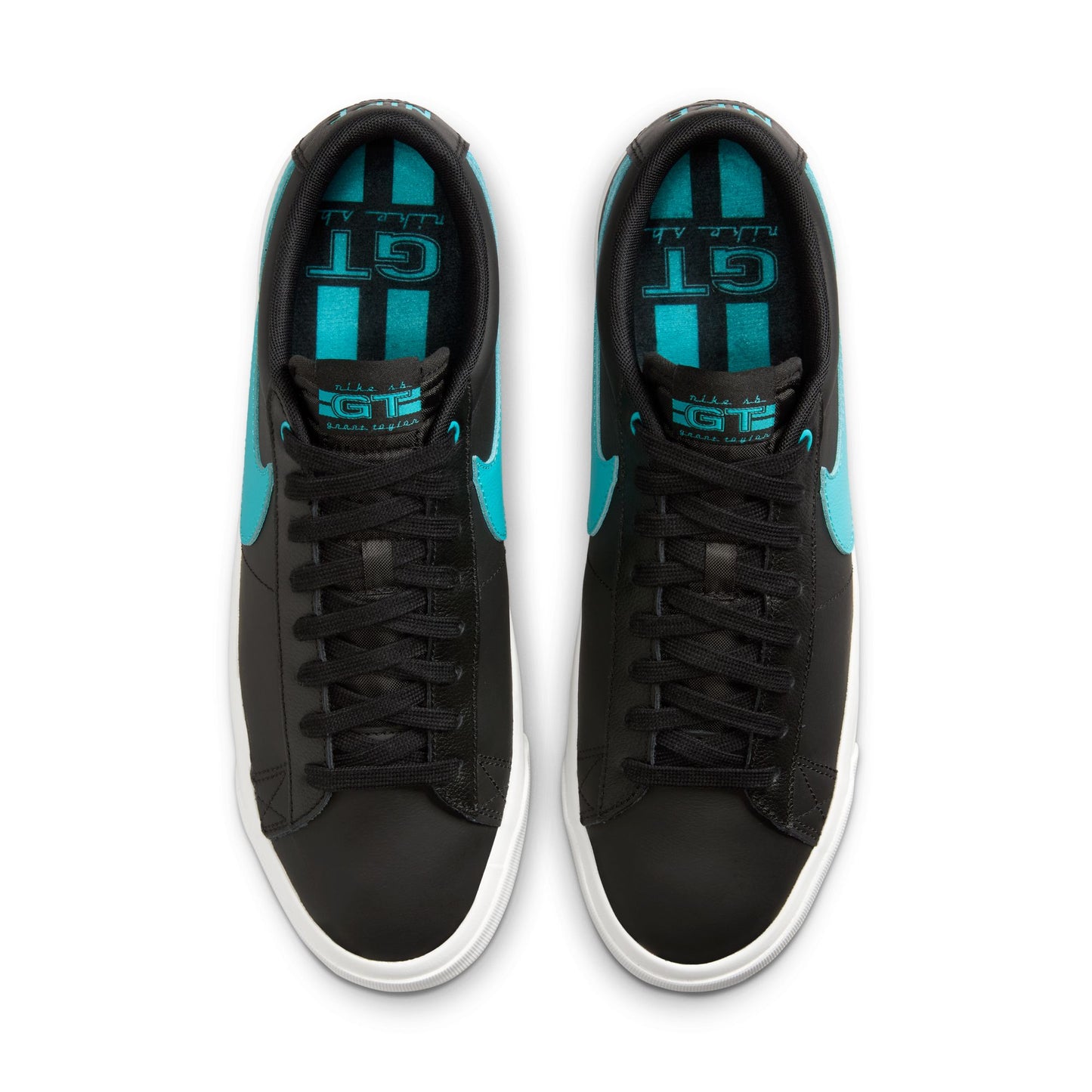 top down view of black leather shoe with blue accents