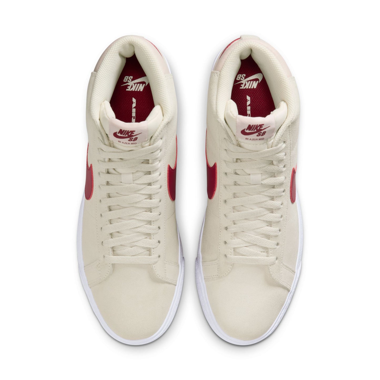 White sneakers with red accents on a white background