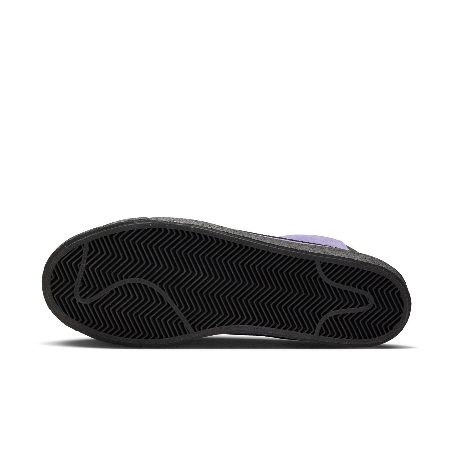 view of black outsole on mid top skateboard shoe