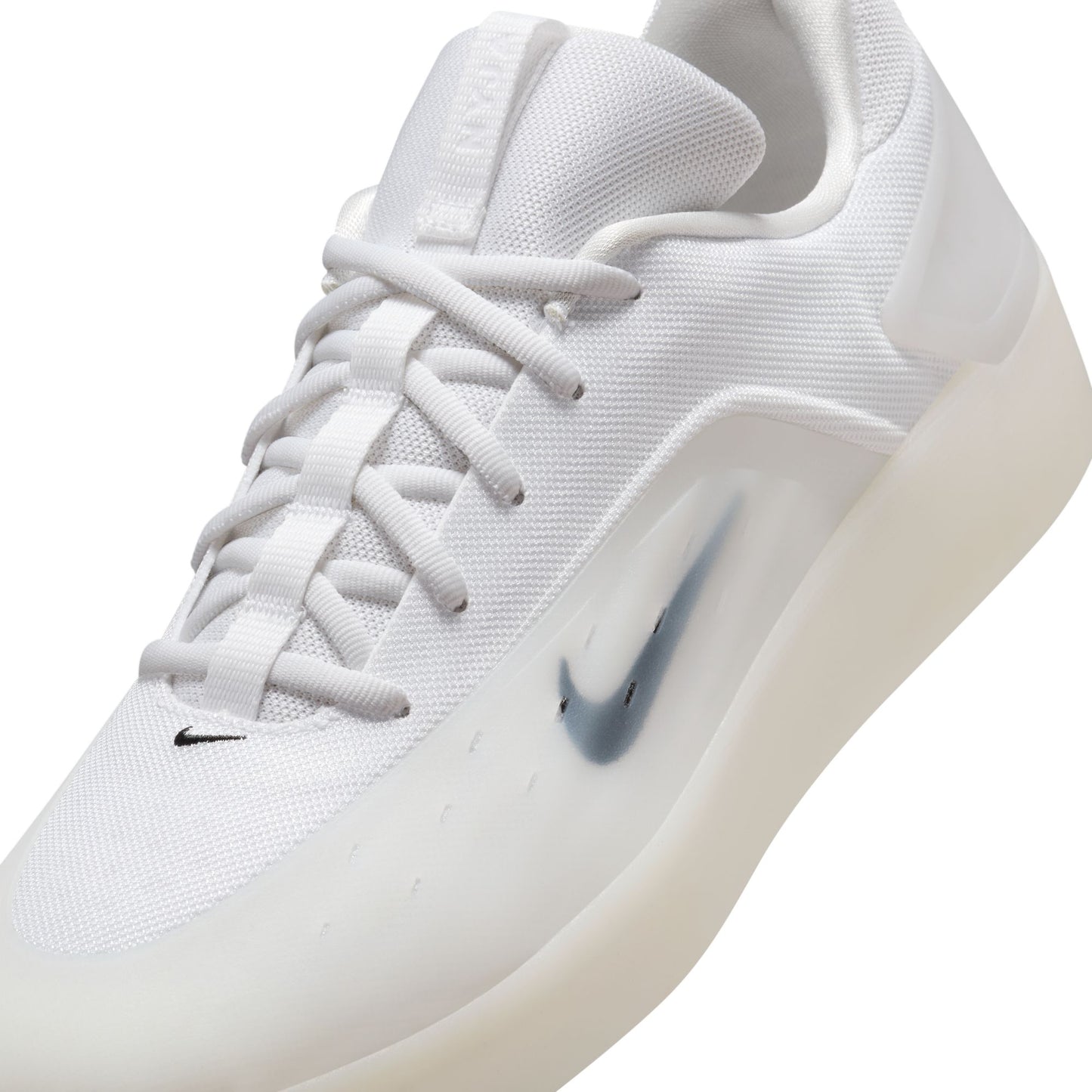 White sneaker with a visible brand logo on a white background