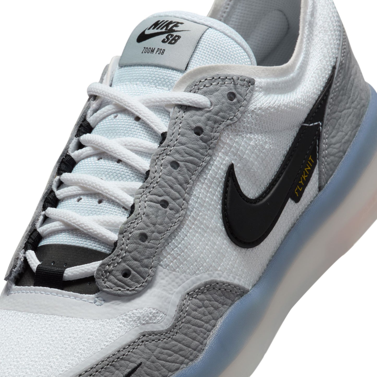 close up view of leather and mesh lowtop running inspired techy skateboard shoe
