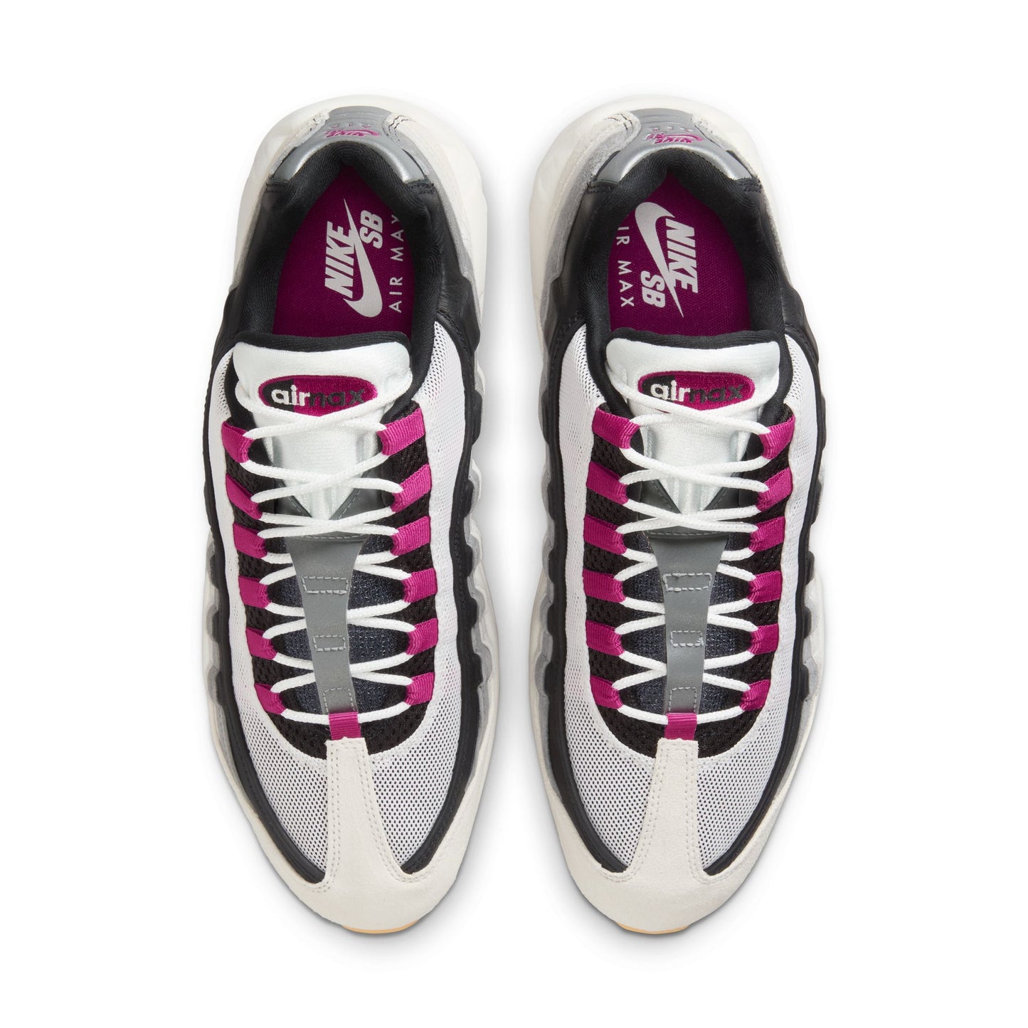 Pair of Nike Air Max sneakers with black, white, and pink design on a white background