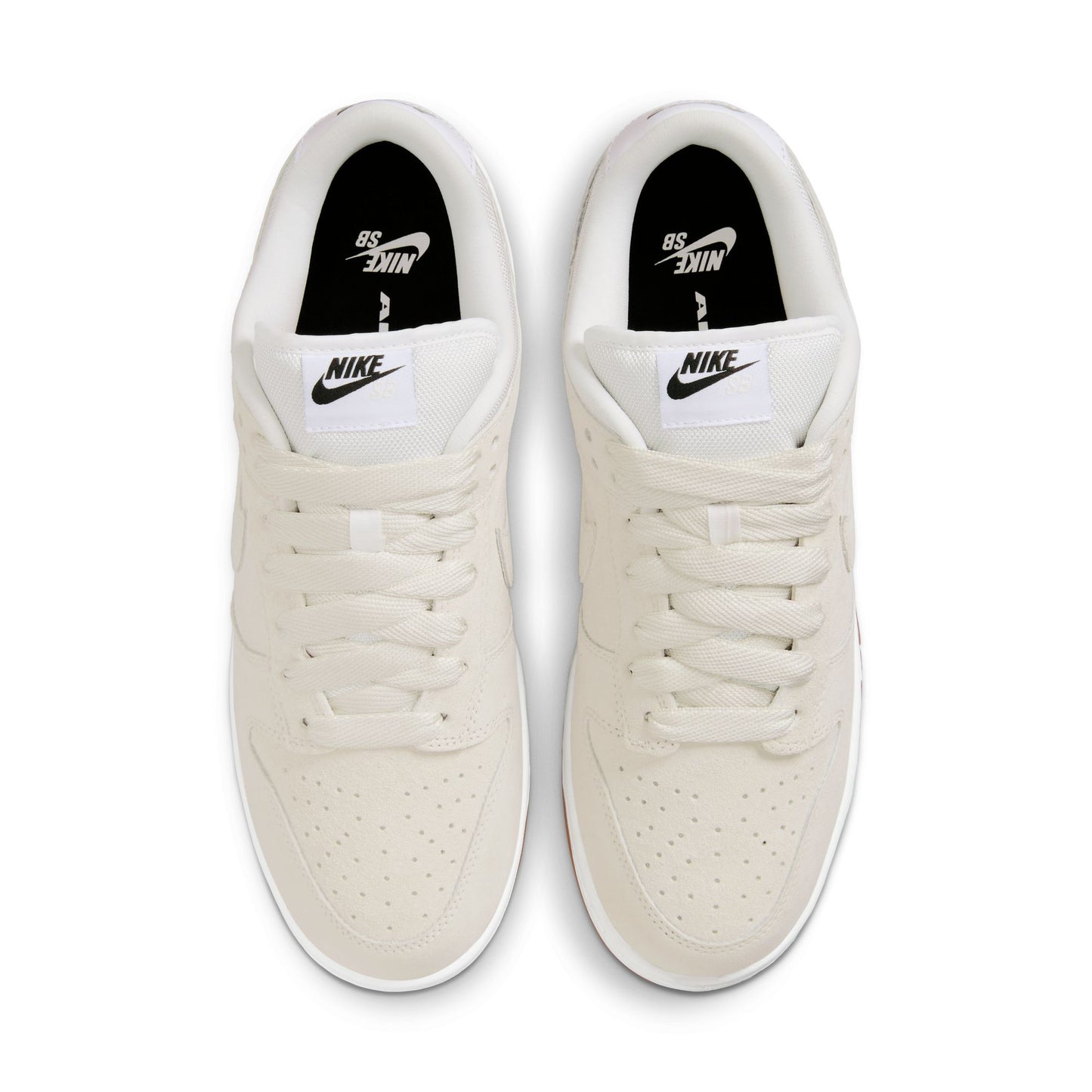 top down view of white suede lowtop sneaker