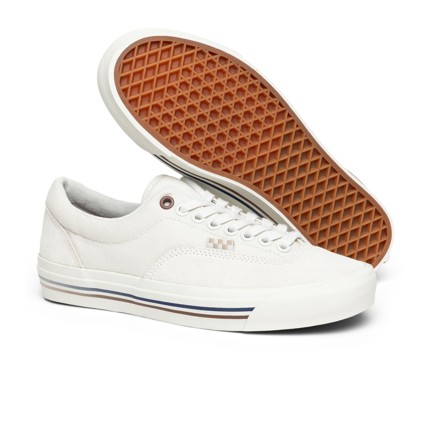 White sneaker with gum sole on a white background