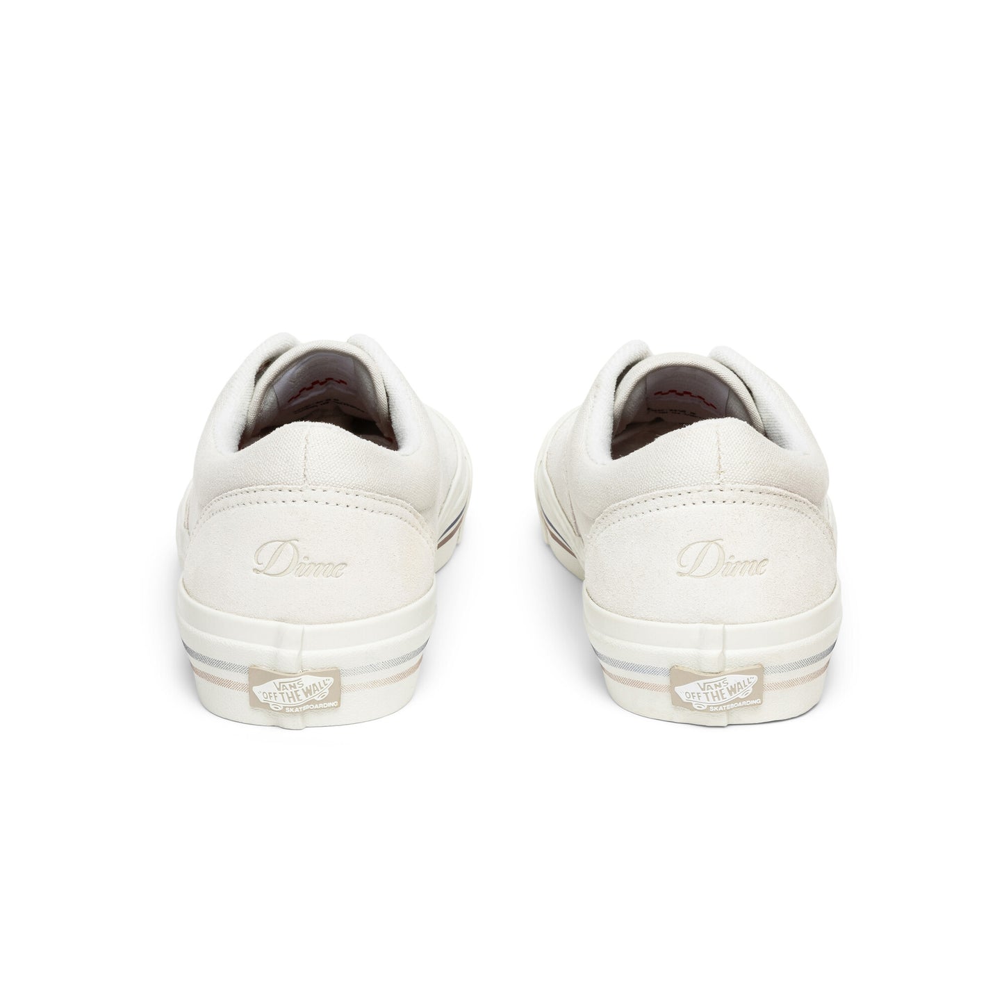 White sneakers with a dime brand logo on a white background