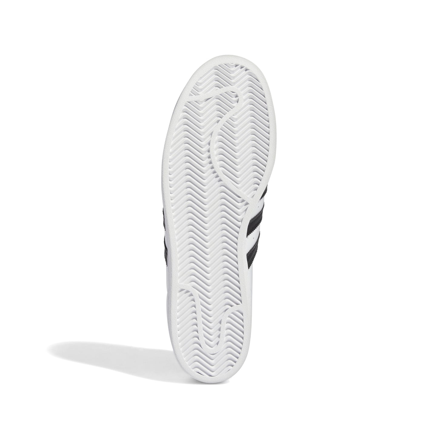view of white rubber outsole on superstar skateboard shoe
