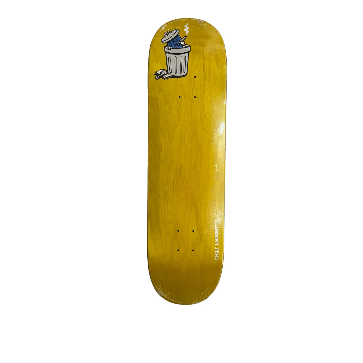 A yellow skateboard deck with a cartoon trash can graphic near the nose, photographed flat on a white surface.
