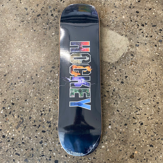 black skateboard deck with hockey block text in the center filled with a variety of images