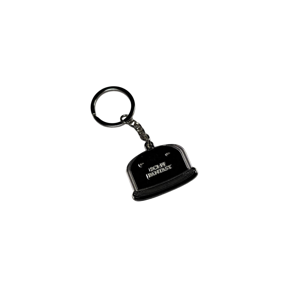 A black hat shaped keychain withwhite printed text, attached to a black split ring with a silver chain, placed on a textured white surface.