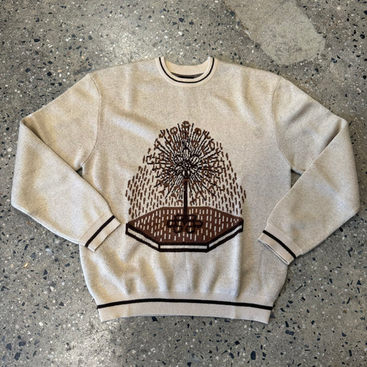 brown tree on cream sweater