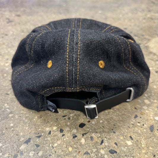 back view of denim hat with gold stitch