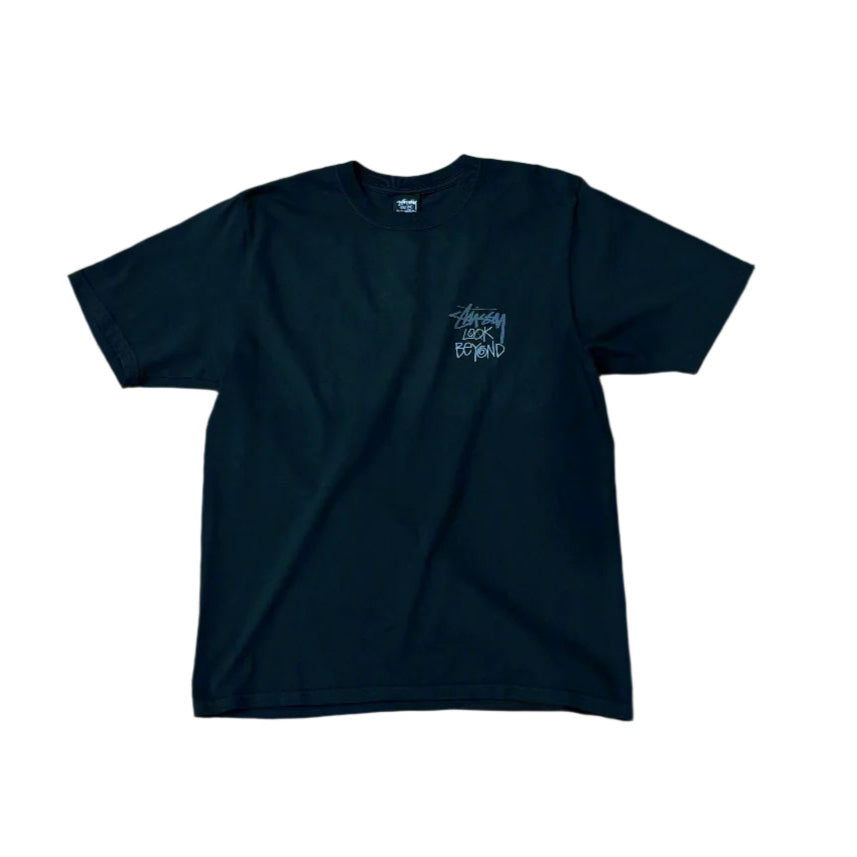 front view of black t-shirt with STUSSY LOOK BEYOND printed on left chest