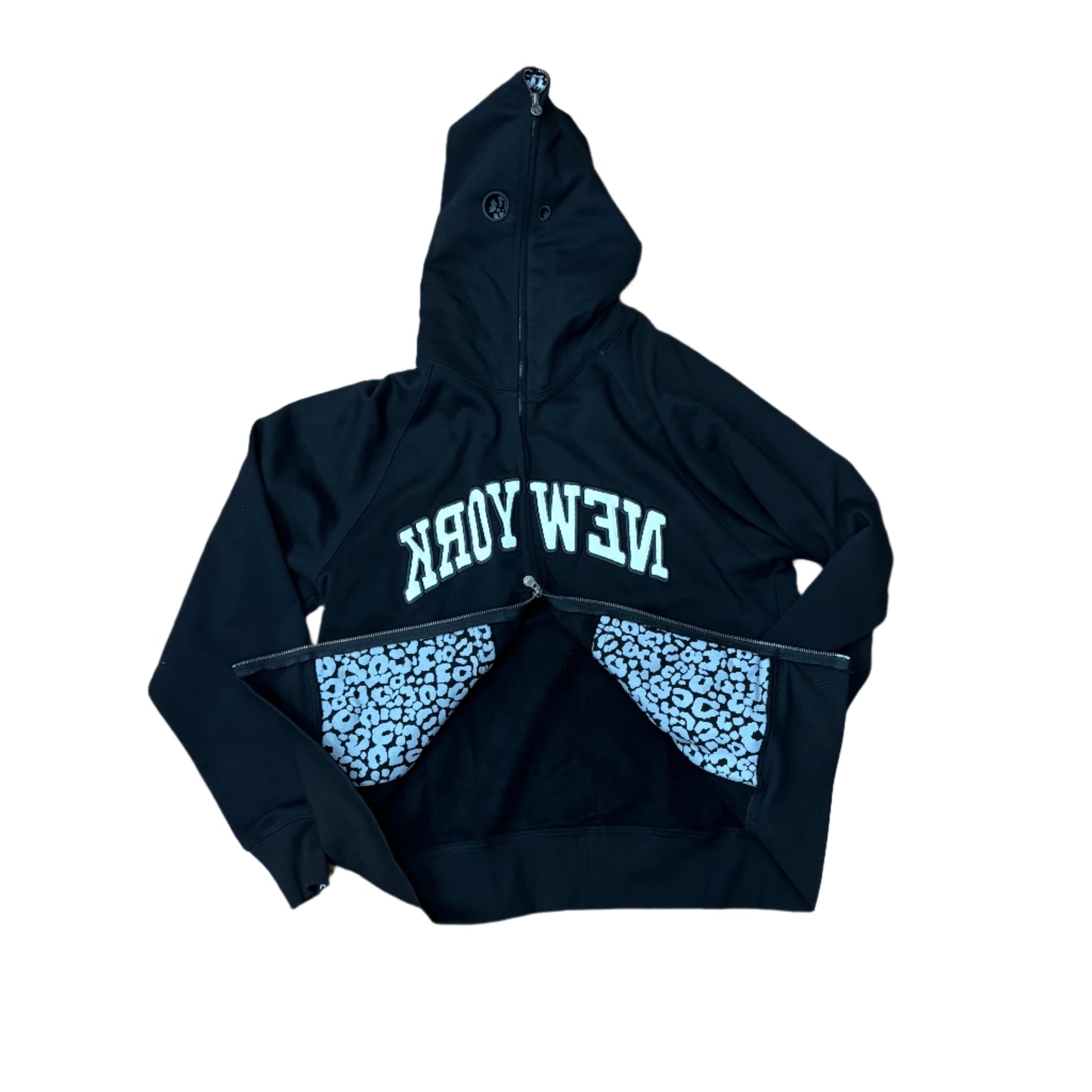 black hoodie with NEW YORK printed in an arch backwards, and printed inside pockets