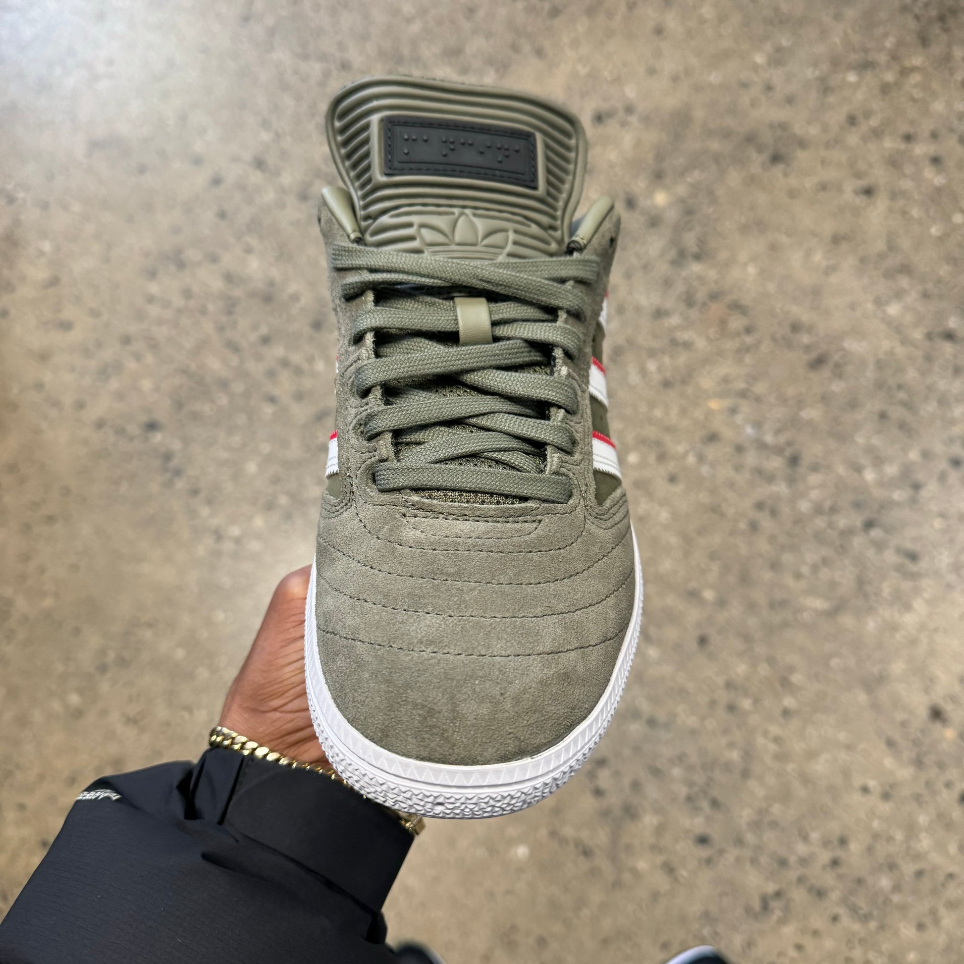 front view of olive suede sneaker