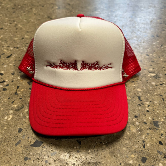 white and red trucker hat with star studs