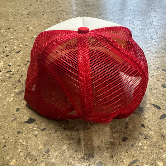back view of red mesh hat with snap closure 