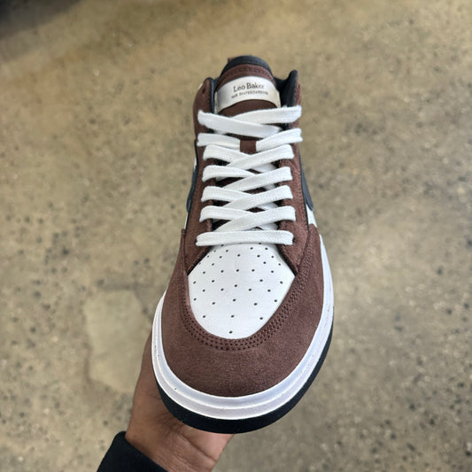 Top down view of brown and white suede and leather skateboard sneaker