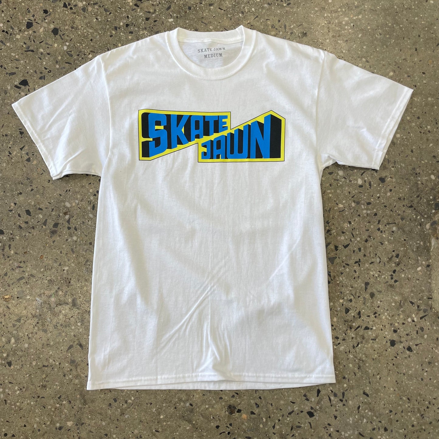 blue, yellow, black logo on white T-shirt