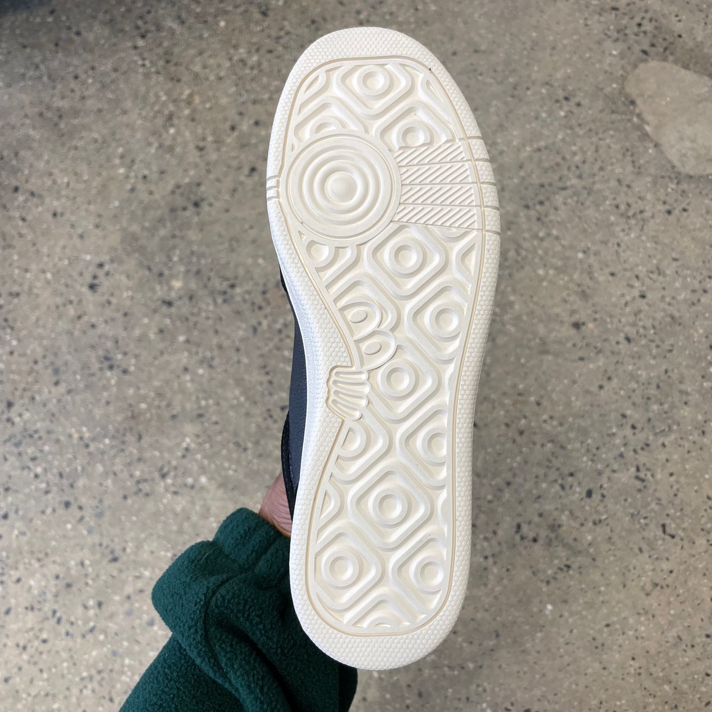 white sole, bottom of sneaker