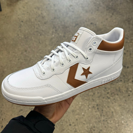 white leather sneaker with brown stripe and star, side view