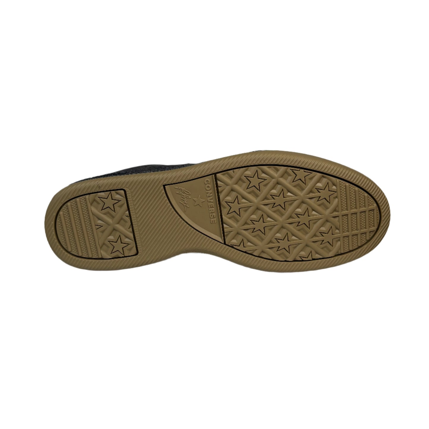 Close-up of a shoe sole with a star pattern on a gray background