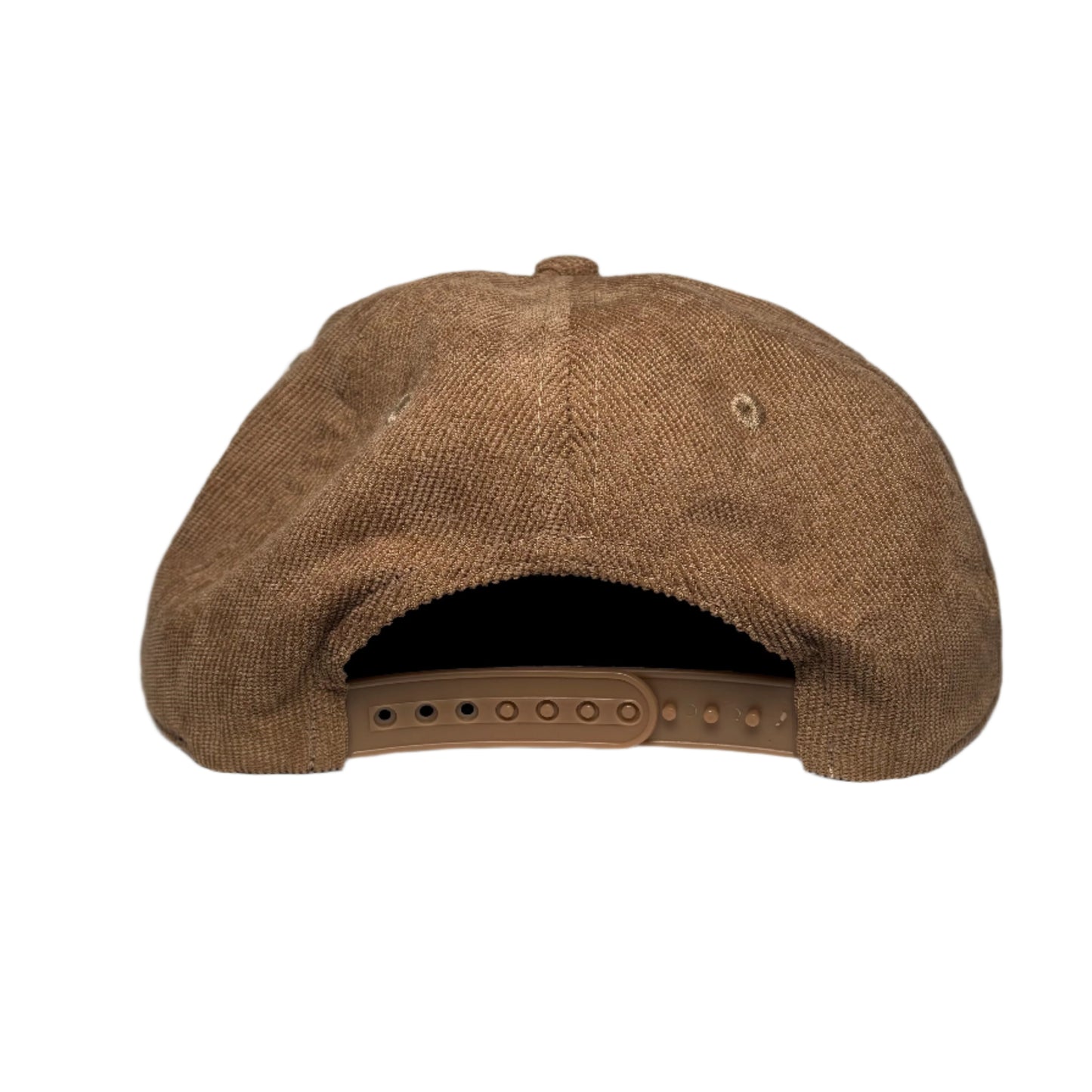 Brown cap on a white surface