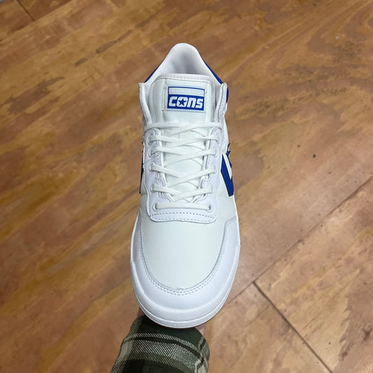 white sneaker with blue stripe and star, front view