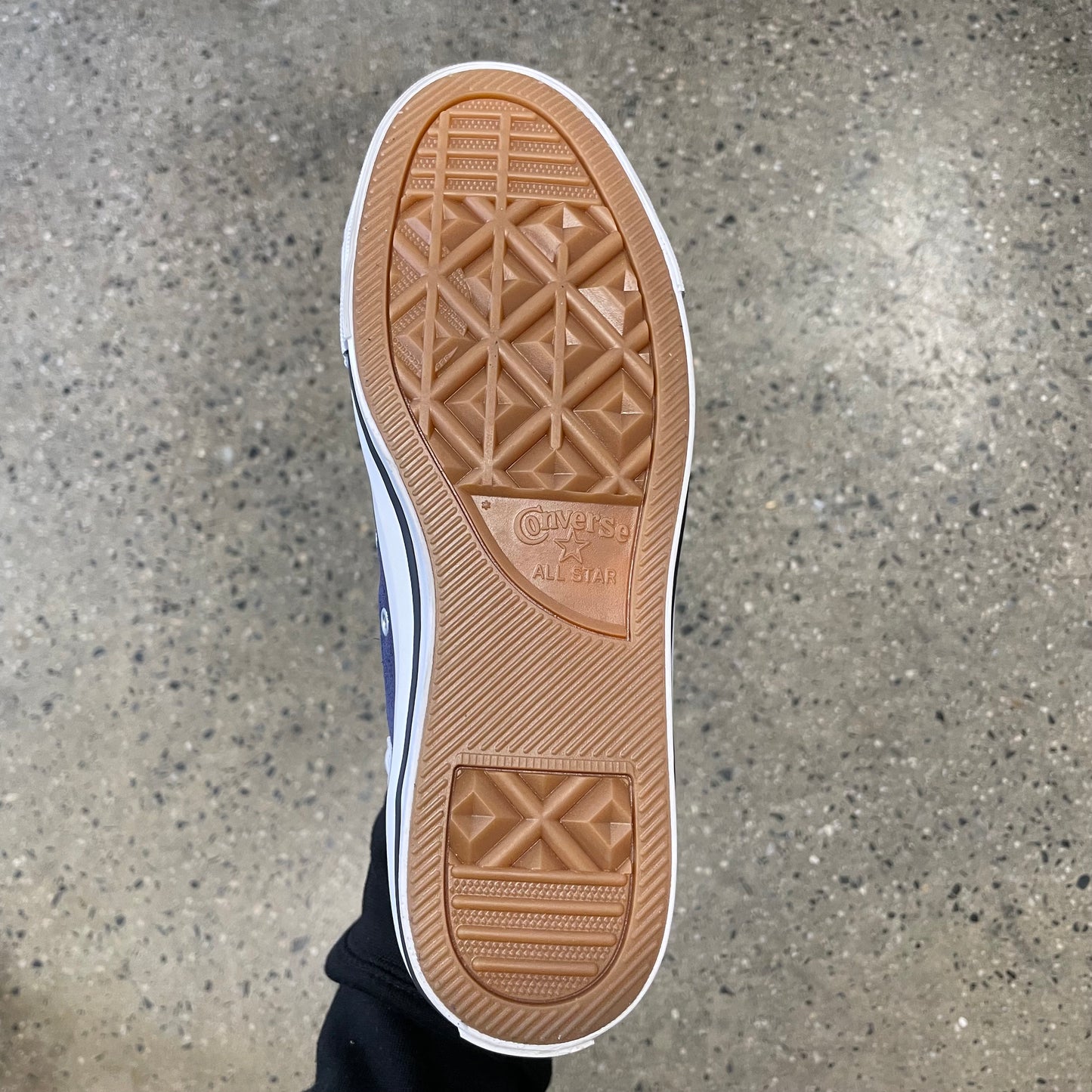 gum sole, bottom on sneaker