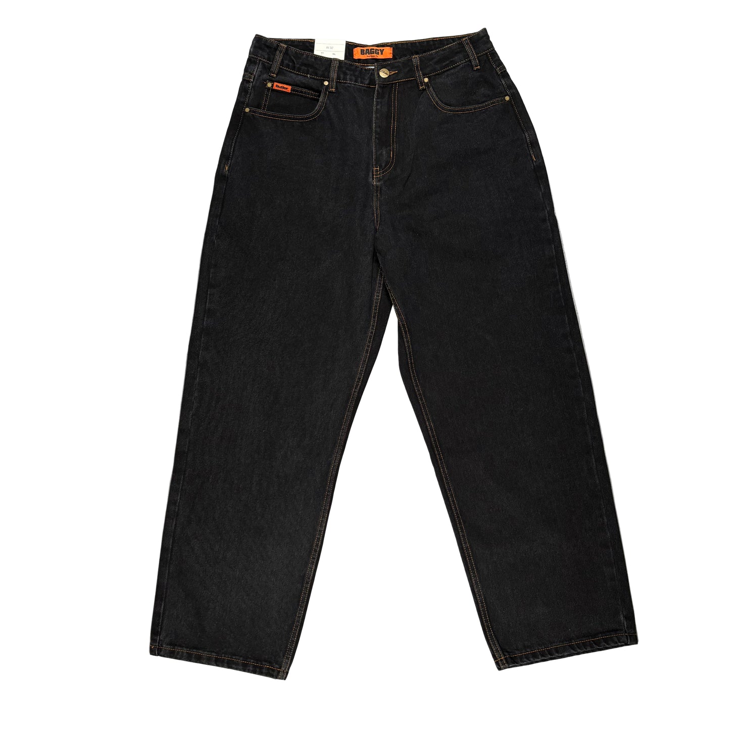 Black jeans on a gray surface with a white background