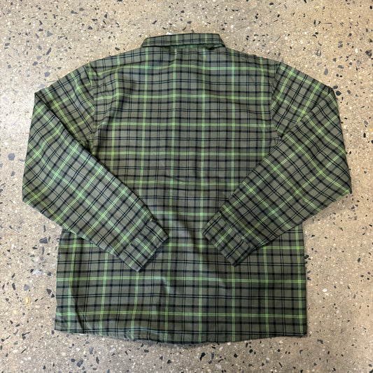 rear view of green and black plaid flannel
