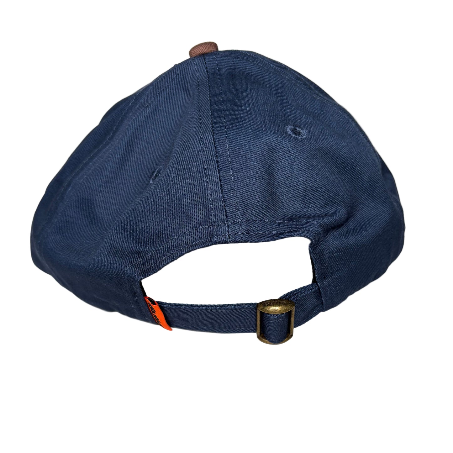 rear view of Blue cap with a gold buckle on a white background