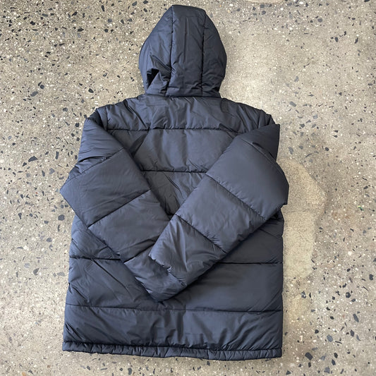 rear view of black hooded puffer jacket