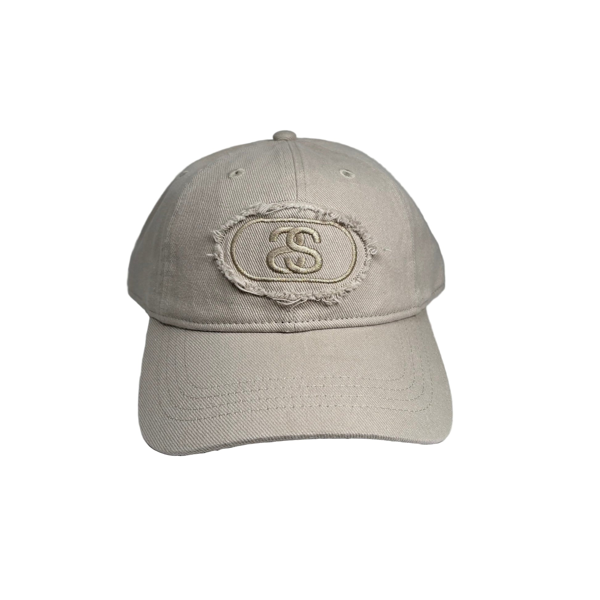 Beige cap with a logo on a white  background
