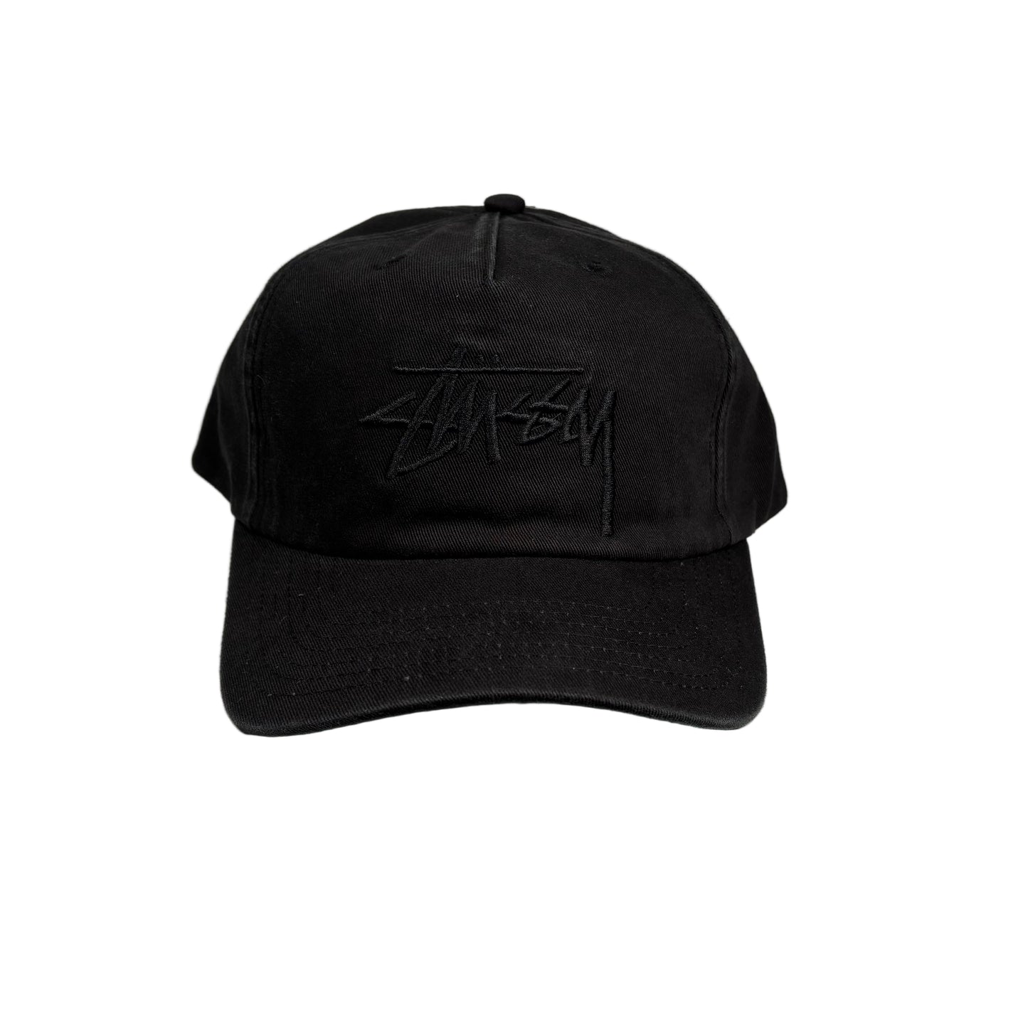 Black cap with a tonal black stusst logo on a white background