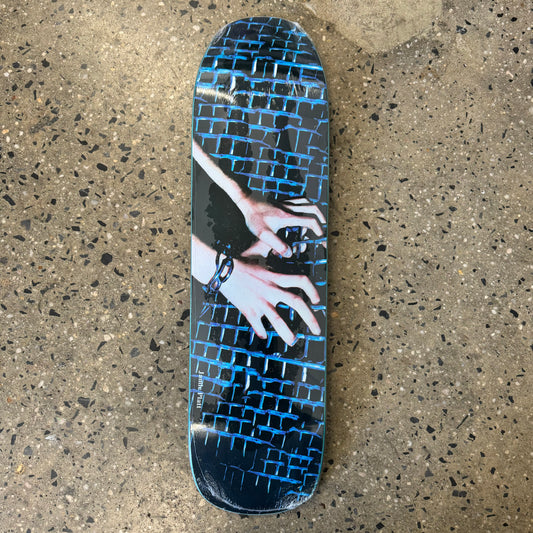two hands, blue and black design on skate deck