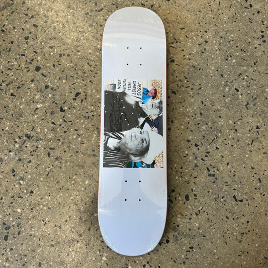 people with Jesus sign on white skate deck