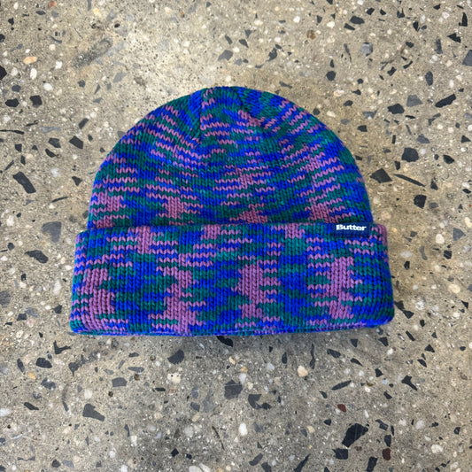 blue, green, and pink beanie