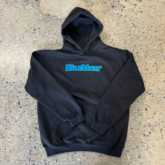 blue and green Butter logo on black hoodie