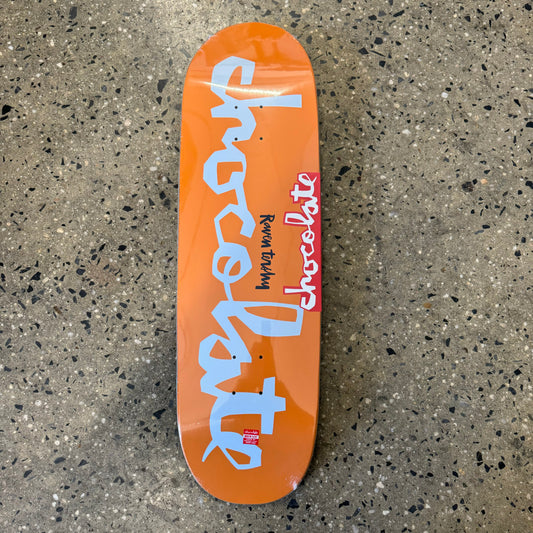 white Chocolate logo on orange skate deck