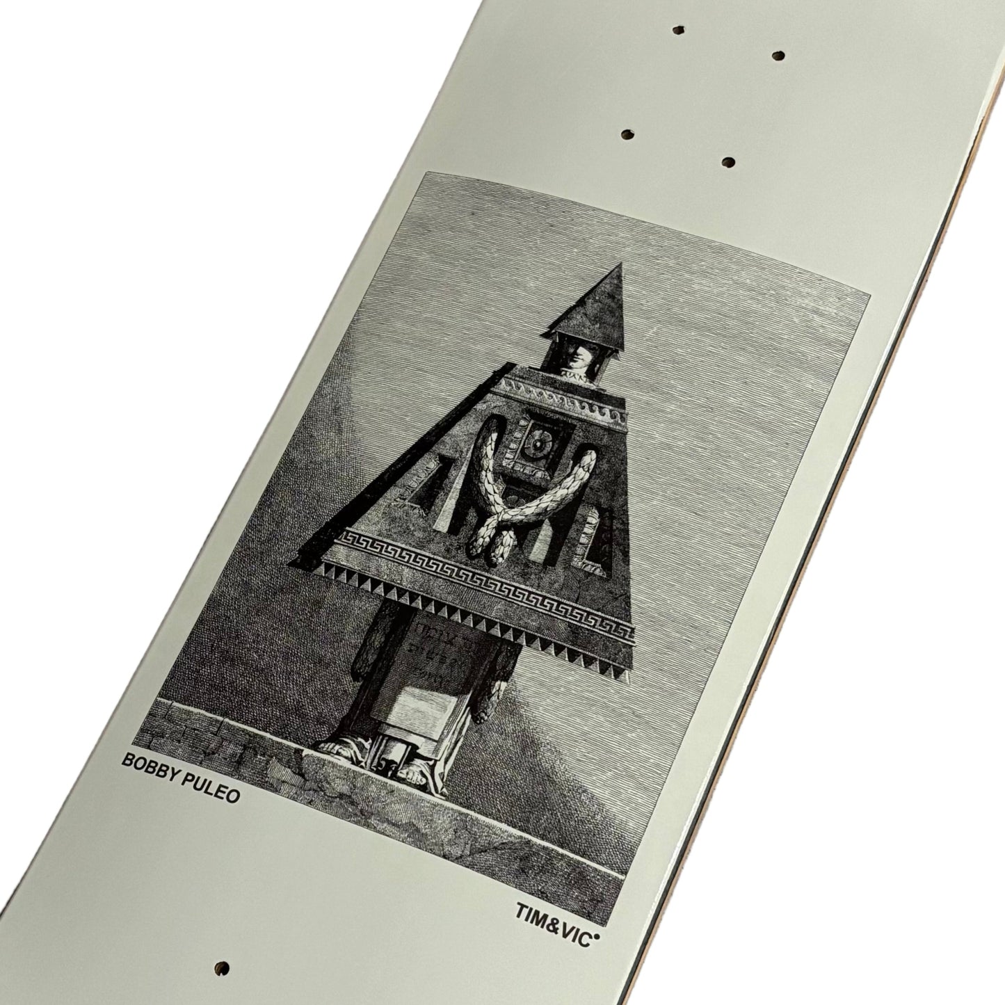 Skateboard deck with a black and white graphic on a whites urface
