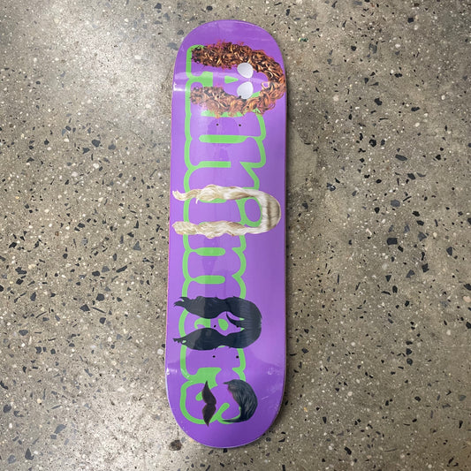 alltimers logo in green on purple skate deck, brown wig on A, blonde wig on i, Black wig on e, dark brown wig and mustache on s
