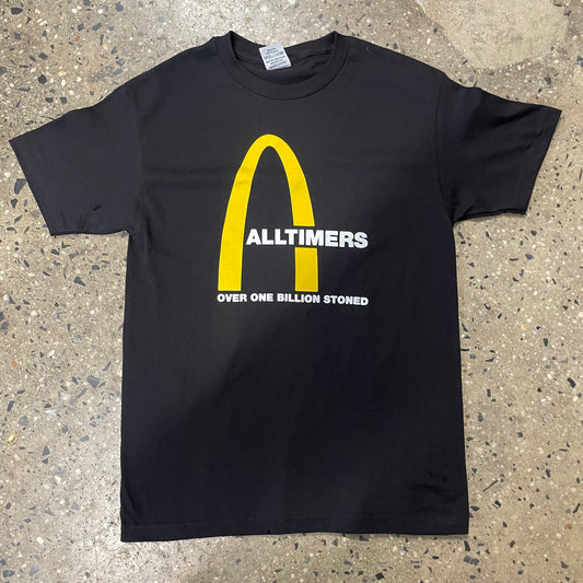 Half yellow arch logo on black t-shirt