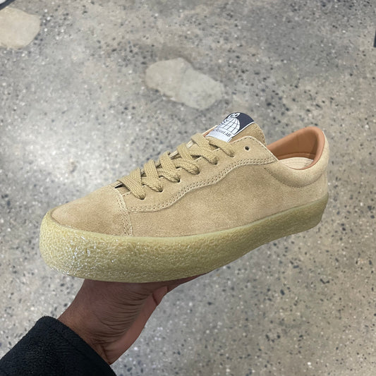 tan suede sneaker with gum sole, side view
