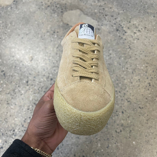 tan suede sneaker with gum sole, front view