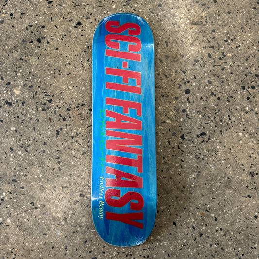 red logo on blue wood grain skate deck (wood grain color may vary)