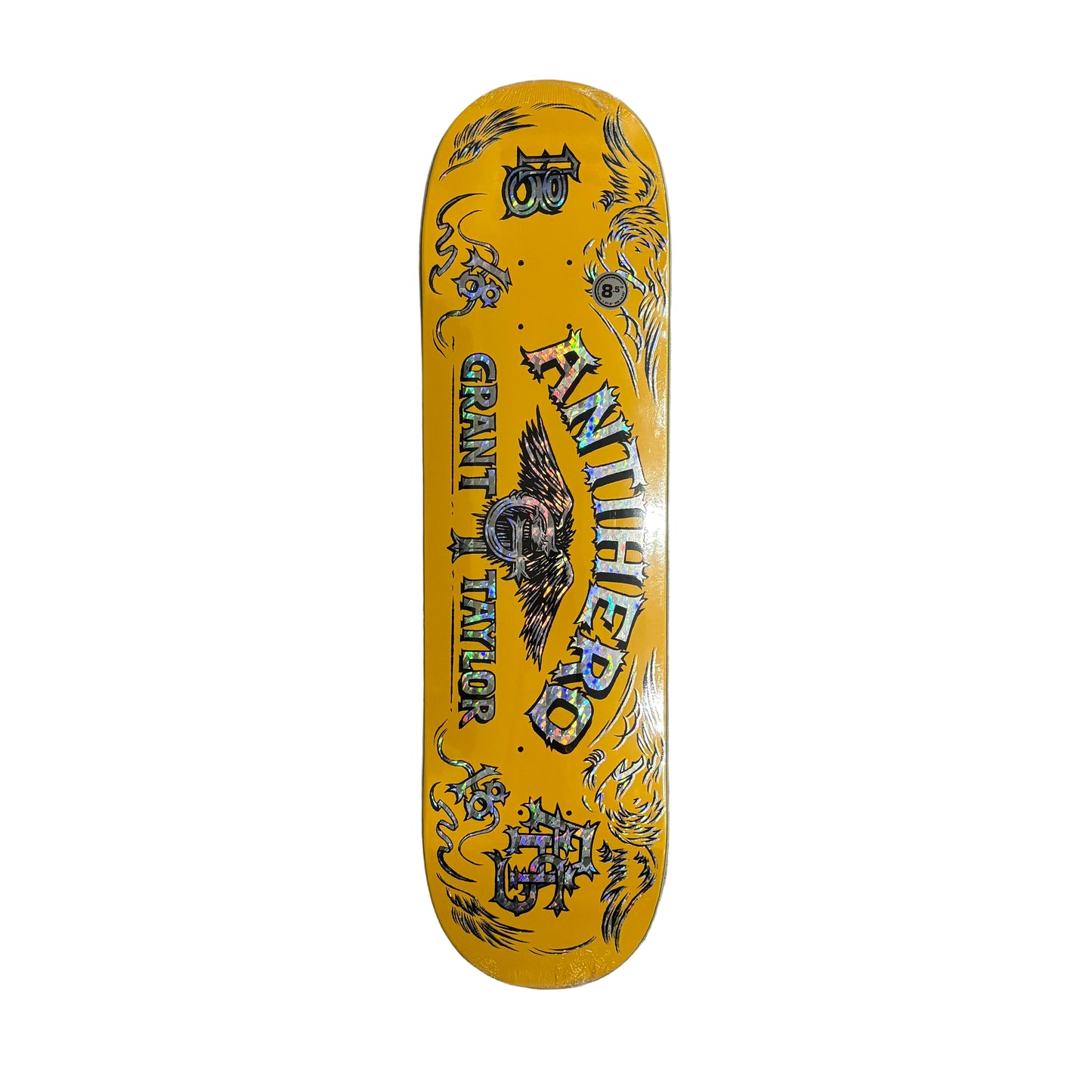 Yellow skateboard deck with black graphics on a white surface