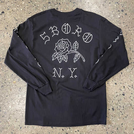 5boro arch logo, rose, and NY in white ink on back of black long sleeve t-shirt. 
